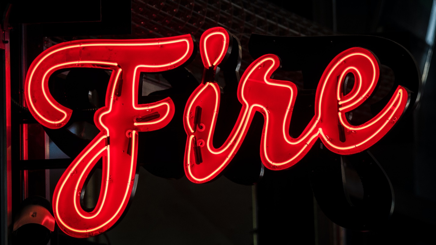 A red neon sign reads 'Fire'